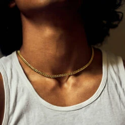 Gold 5mm Curb Chain 18 Gold 5mm Curb Chain -SERGE DENIMES Shop Gold Curb Chain Necklace Model Shot