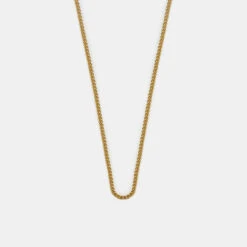 Gold 1.5mm Curb Chain 14 Gold 1.5mm Curb Chain -SERGE DENIMES Shop Gold Non Adjustable Chain Product Shot Grey